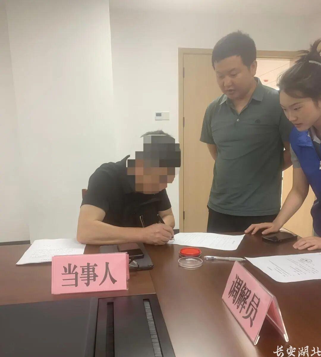 东湖高新区法院-“十案缠身”到“一案了结”2.jpg