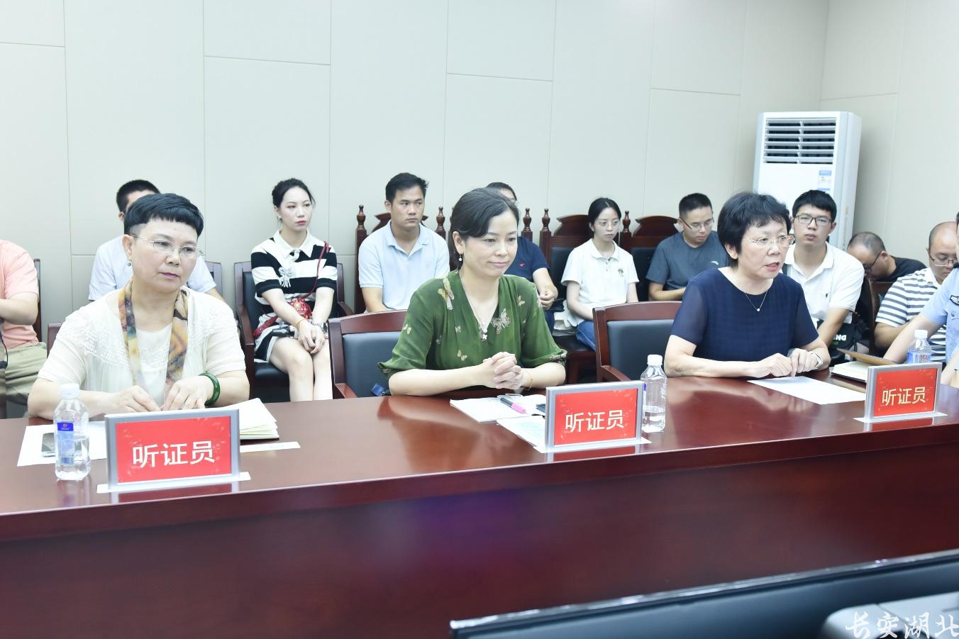 3洪山区检察院-组织召开某小区污水排放综合治理行政公益诉讼听证会.png
